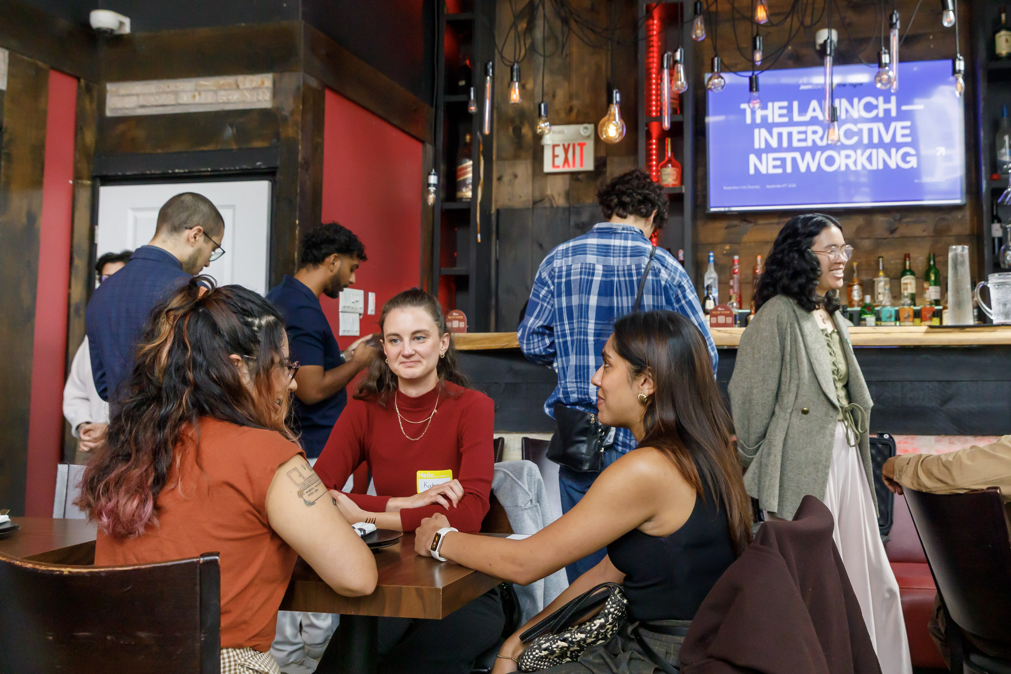Professionals chatting at a networking event