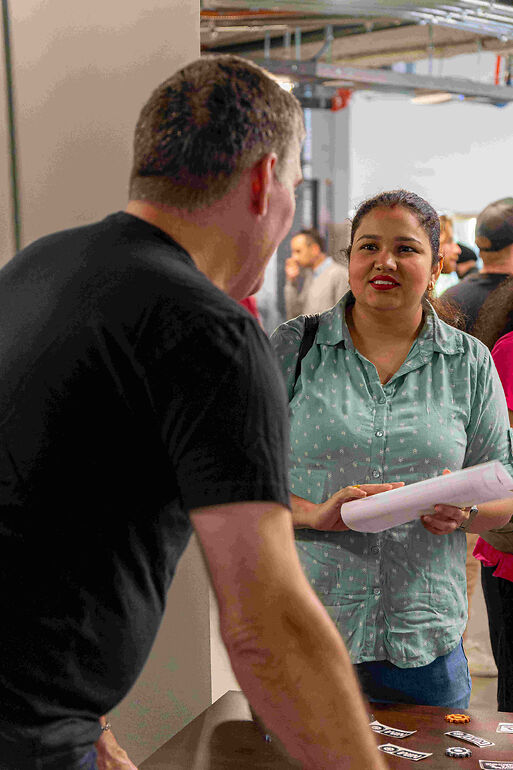 Attendees engaging with Jam Bingo