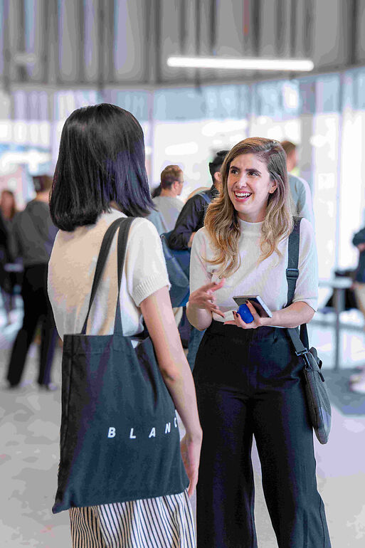Attendees engaging in an icebreaker activity during a seminar