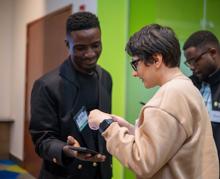 University students laughing during an icebreaker activity